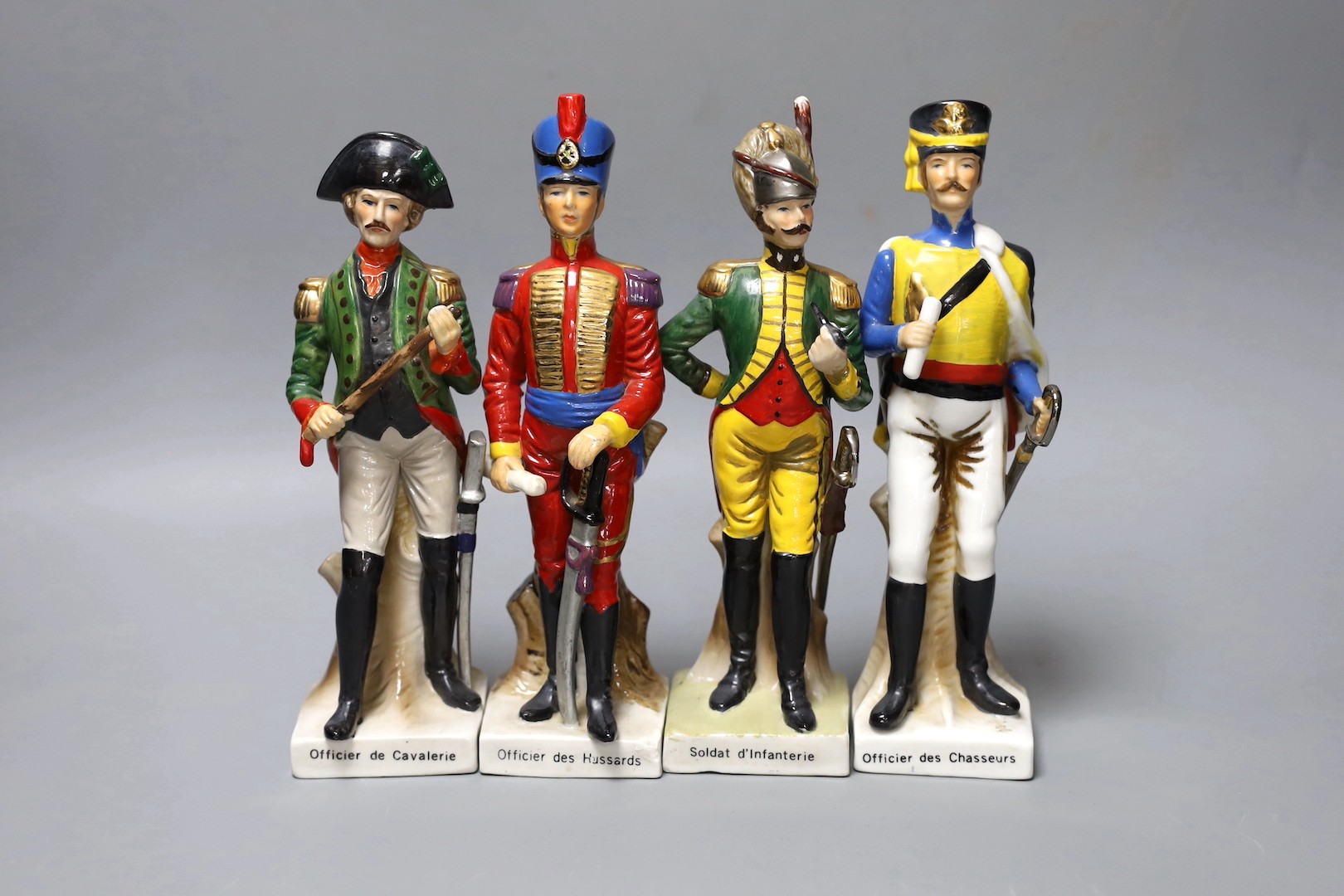 A set of four Continental porcelain models of soldiers, tallest 22 cms high.